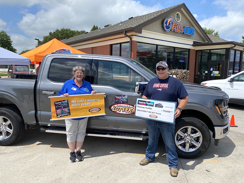 Thomas Treffer of Juniata won the fourth Ford F-150 truck prize in the 2025 edition of the Nebraska Lottery's $2 Truck$ & Buck$ Scratch game. He was presented with his new truck at an event at Fill-N-Chill #005, 2815 Parklane Drive in Hastings on July 24, 2025. Also pictured: Michelle Thomas, Fill-N-Chill store manager
